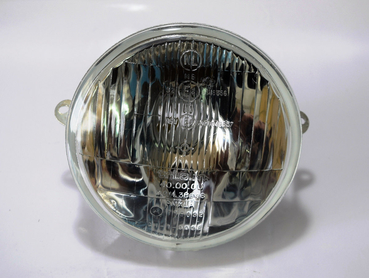 FARO ANTERIORE TRIOM VESPA PX 125-150-200 ORIGINALE FARO ANTERIORE TRIOM VESPA PX 125-150-200 ORIGINALE